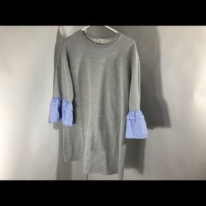 gray sweater dress with blue ruffle cuff